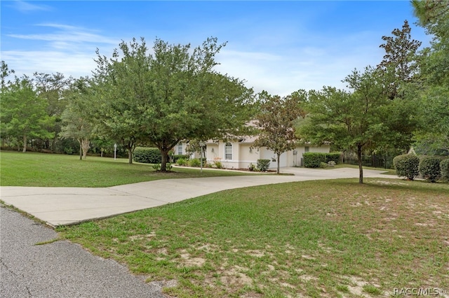 exterior space featuring a front yard