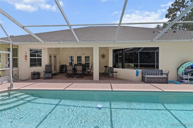 9989 N Langdon Rd, Citrus Springs, FL 34434 - outdoor pool with a patio, a lanai, and ceiling fan
