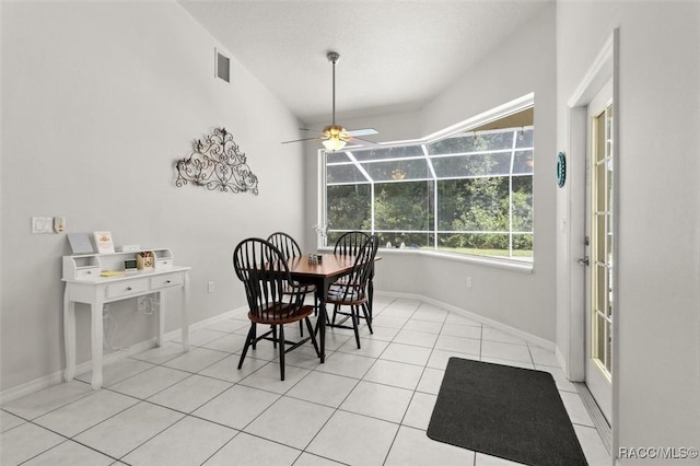 9989 N Langdon Rd, Citrus Springs, FL 34434 - dining space with ceiling fan and light tile patterned floors