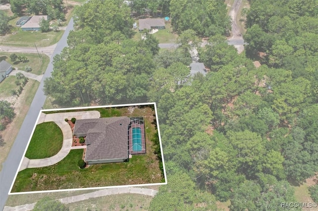 9989 N Langdon Rd, Citrus Springs, FL 34434 - aerial overview of property's location featuring property parcel outlined