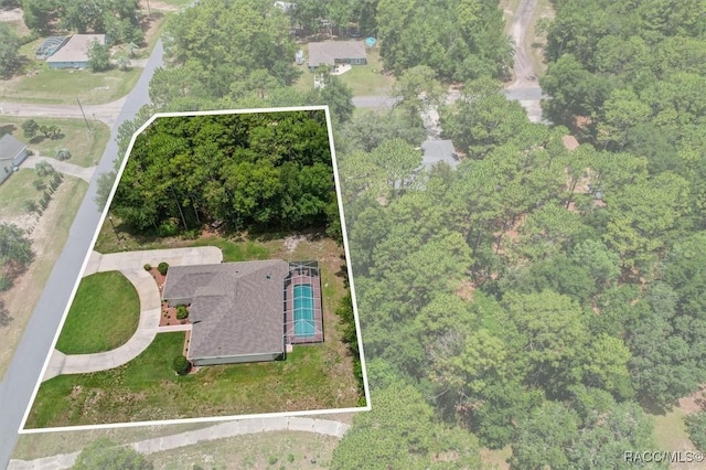 9989 N Langdon Rd, Citrus Springs, FL 34434 - aerial overview of property's location featuring property boundaries highlighted