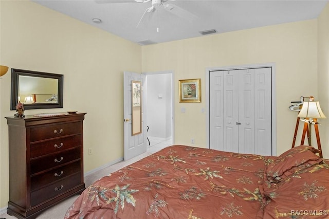 9989 N Langdon Rd, Citrus Springs, FL 34434 - bedroom featuring a closet, ceiling fan, and light colored carpet