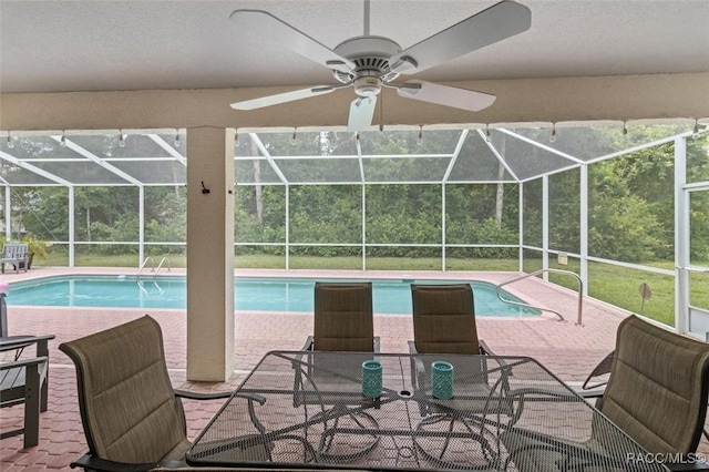 9989 N Langdon Rd, Citrus Springs, FL 34434 - swimming pool with a patio area, a lanai, and ceiling fan