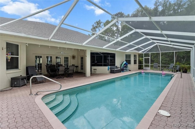 9989 N Langdon Rd, Citrus Springs, FL 34434 - swimming pool featuring a patio area, a ceiling fan, and a lanai