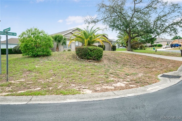 5694 W Hunters Ridge Cir, Lecanto, FL 34461 - view of front of home featuring an attached garage
