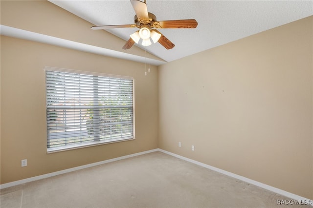 5694 W Hunters Ridge Cir, Lecanto, FL 34461 - carpeted spare room featuring lofted ceiling, a ceiling fan, and baseboards