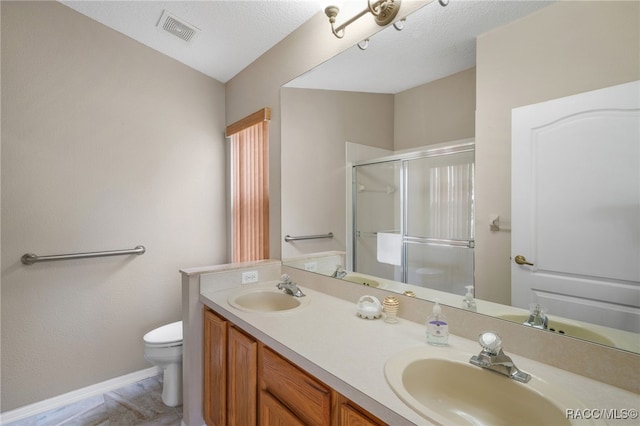 5694 W Hunters Ridge Cir, Lecanto, FL 34461 - full bath featuring toilet, a stall shower, double vanity, and baseboards