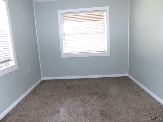 view of carpeted spare room