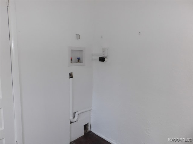clothes washing area with hookup for a washing machine