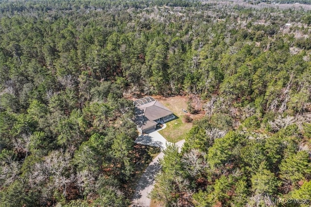 drone / aerial view with a forest view