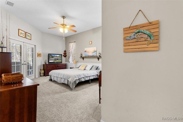 bedroom with ceiling fan, carpet flooring, visible vents, access to exterior, and french doors