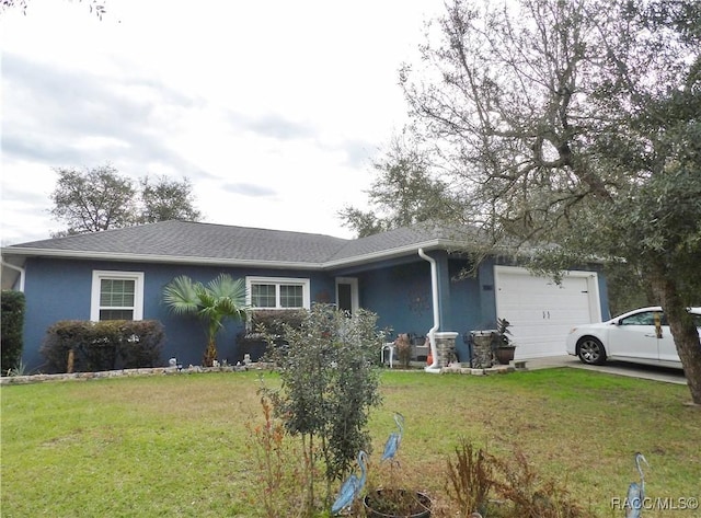 ranch-style house with a front lawn and a garage