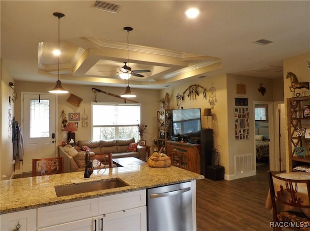 kitchen featuring white cabinets, stainless steel dishwasher, light stone countertops, and hanging light fixtures