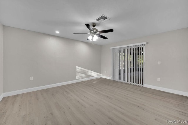 spare room featuring recessed lighting, visible vents, a ceiling fan, light wood-type flooring, and baseboards