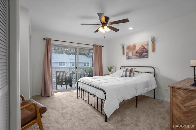 bedroom with ceiling fan, access to exterior, and light carpet