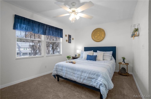 bedroom with ceiling fan and carpet