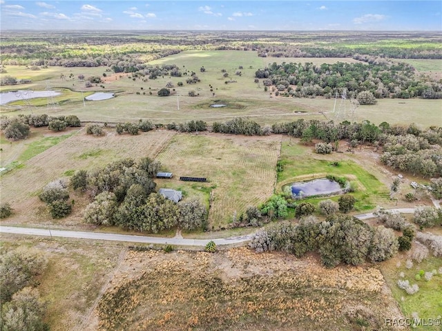 aerial view featuring a water view and a rural view