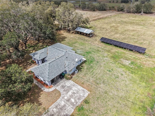 birds eye view of property featuring a rural view