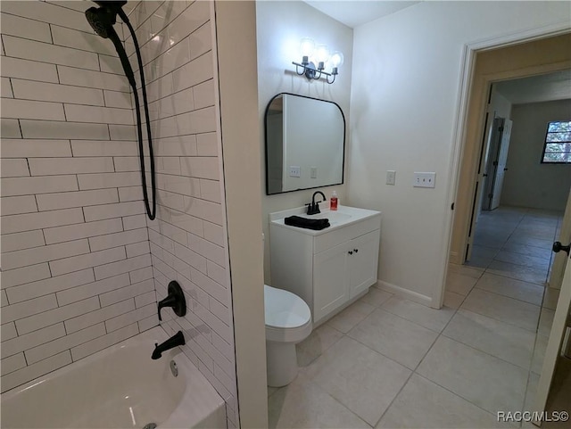 full bathroom with tile patterned flooring, vanity, toilet, and tiled shower / bath