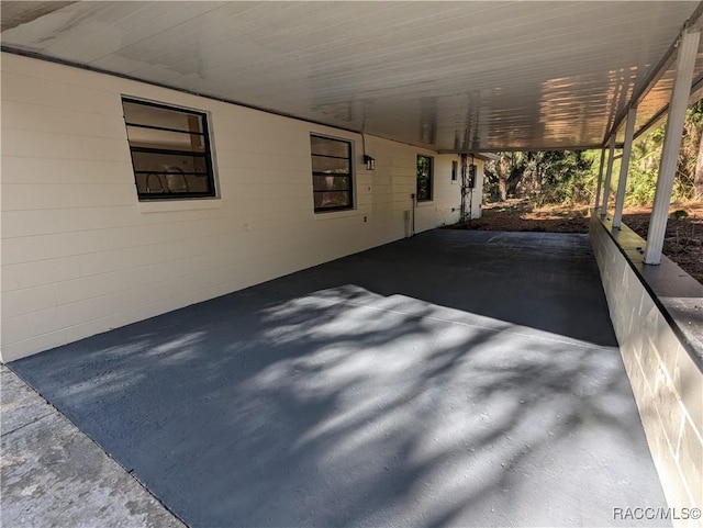 view of patio with a carport