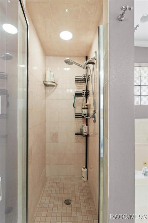 bathroom featuring a stall shower