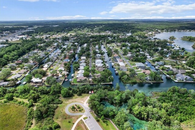 aerial view with a water view and a residential view