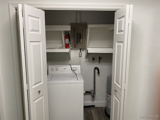 washroom featuring washer / clothes dryer, water heater, electric panel, and dark hardwood / wood-style flooring