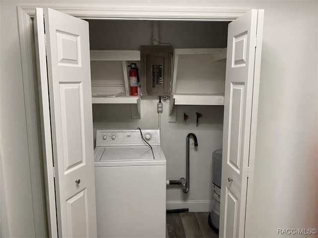 45 S Davis St, Beverly Hills, FL 34465 - washroom featuring washer / clothes dryer, electric panel, dark wood finished floors, and baseboards