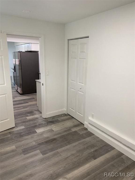 45 S Davis St, Beverly Hills, FL 34465 - empty room with dark wood-type flooring and baseboards