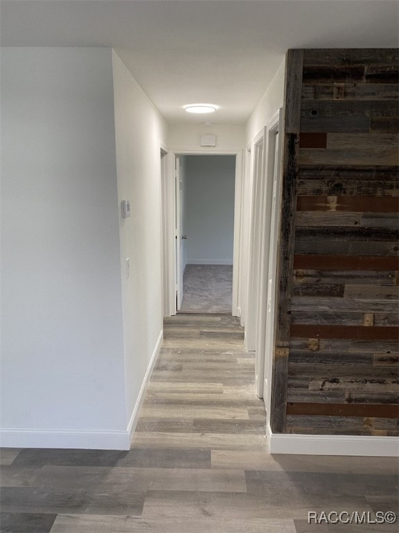 hallway featuring hardwood / wood-style flooring