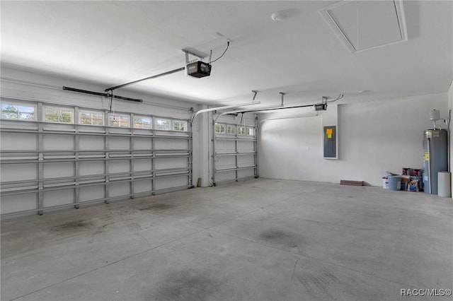 garage featuring electric panel, a garage door opener, and water heater