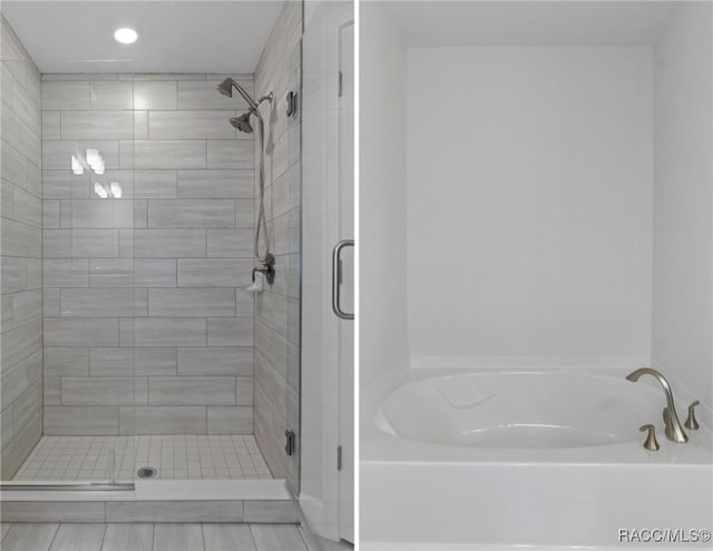 full bathroom featuring a bath and a stall shower