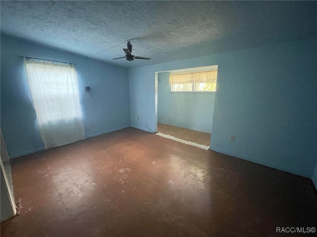 120 NW Magnolia Cir, Crystal River, FL 34428 - unfurnished room featuring ceiling fan and a textured ceiling