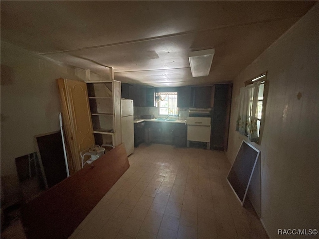 120 NW Magnolia Cir, Crystal River, FL 34428 - kitchen featuring freestanding refrigerator and light wood-style flooring