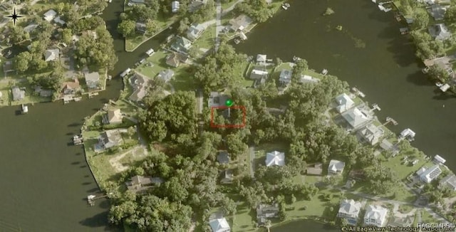 120 NW Magnolia Cir, Crystal River, FL 34428 - aerial view of property's location featuring a large body of water and nearby suburban area