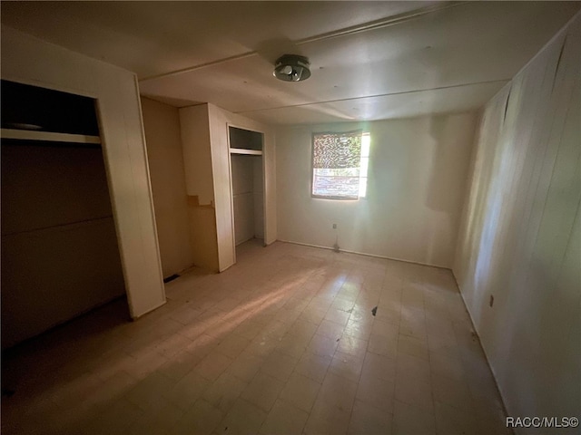 120 NW Magnolia Cir, Crystal River, FL 34428 - unfurnished bedroom with light wood-type flooring