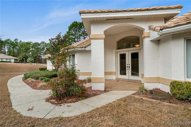 entrance to property with french doors