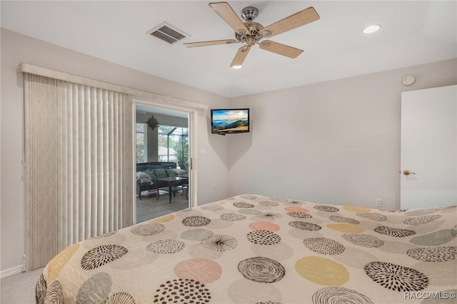 carpeted bedroom featuring ceiling fan and access to exterior