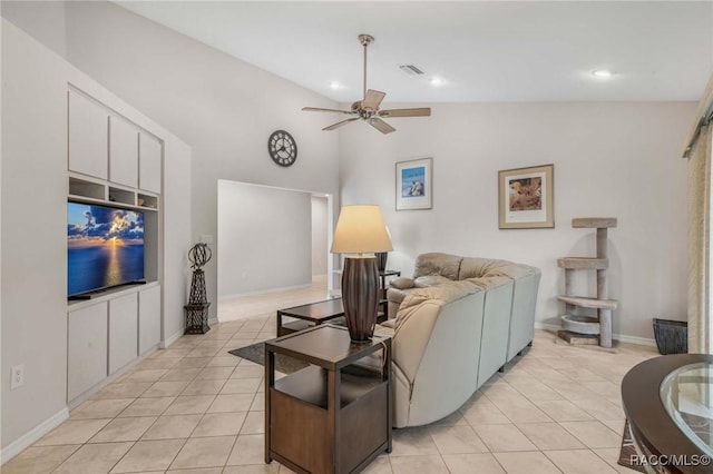 tiled living room with ceiling fan and lofted ceiling