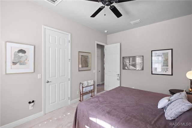 bedroom with ceiling fan and carpet