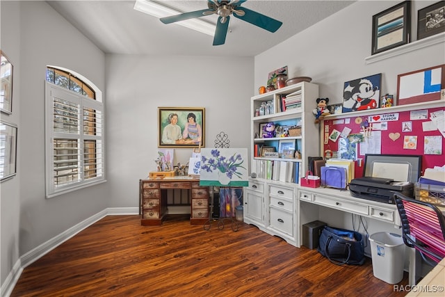 office area featuring plenty of natural light, ceiling fan, dark wood-type flooring, and vaulted ceiling