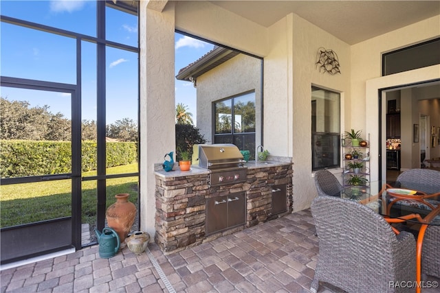 sunroom with sink