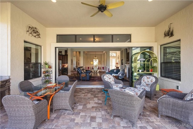 view of patio / terrace featuring an outdoor living space and ceiling fan