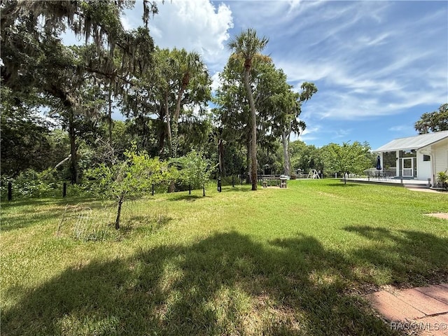 5217 Riverside Dr, Yankeetown, FL 34498 - view of green lawn