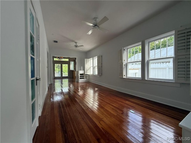 5217 Riverside Dr, Yankeetown, FL 34498 - unfurnished room with healthy amount of natural light, hardwood / wood-style floors, and a ceiling fan