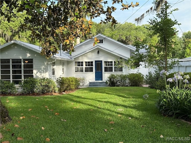 5217 Riverside Dr, Yankeetown, FL 34498 - view of front of home featuring a front yard and entry steps