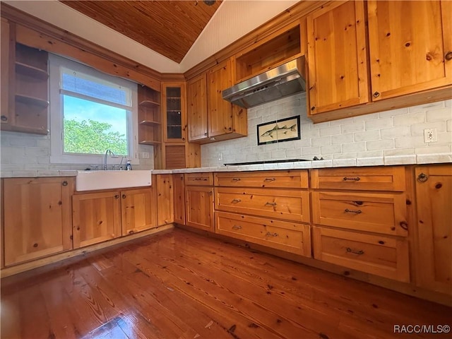 5217 Riverside Dr, Yankeetown, FL 34498 - kitchen with range hood, open shelves, wooden ceiling, vaulted ceiling, and dark wood-style floors