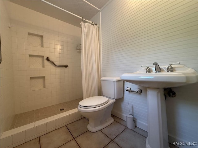 5217 Riverside Dr, Yankeetown, FL 34498 - bathroom with tile patterned flooring and a stall shower