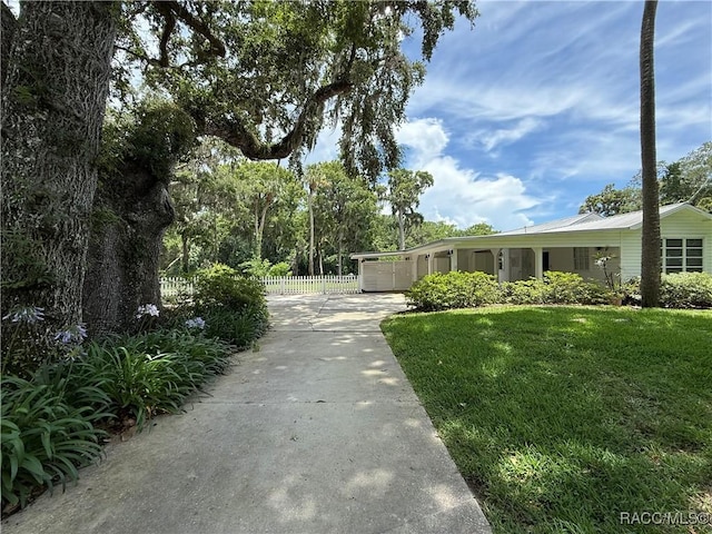 5217 Riverside Dr, Yankeetown, FL 34498 - view of community featuring concrete driveway and an attached garage