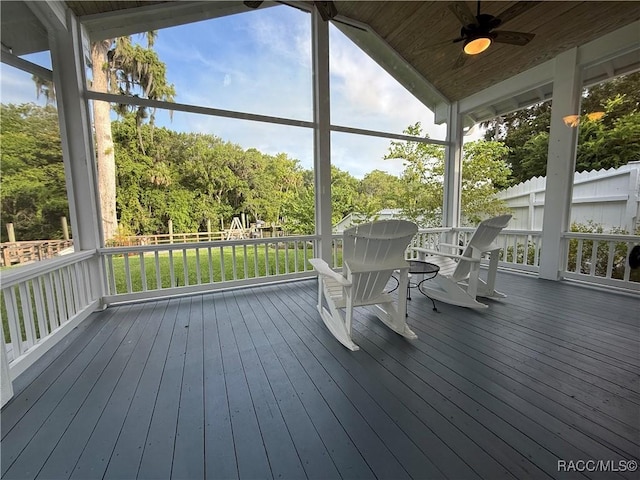 5217 Riverside Dr, Yankeetown, FL 34498 - wooden deck with a ceiling fan and a lawn